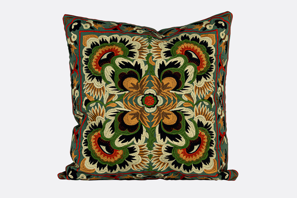 Colorful, kaleidescopic embroidered 18" Square throw pillow in green, yellow, red, and black