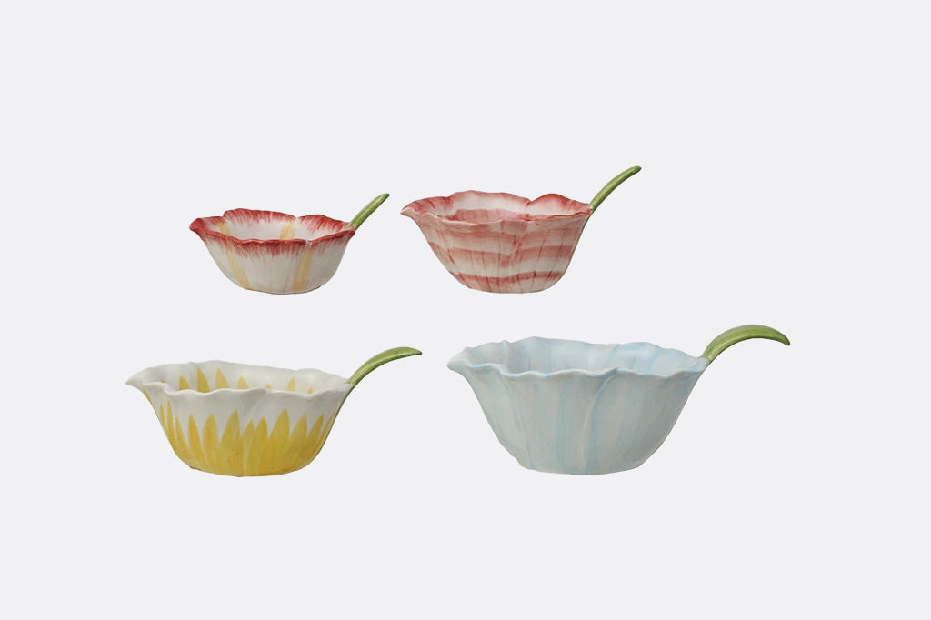 Four ceramic bowls with flower petal shape; 4 nesting sizes: petite, small, medium, large