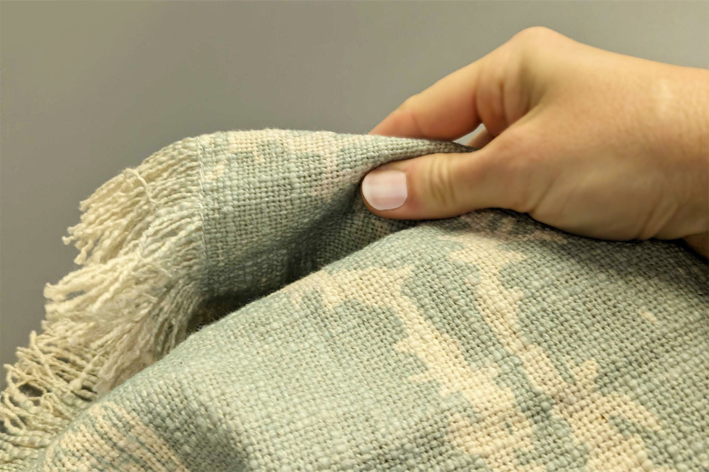 detailed view of woven texture of blanket 