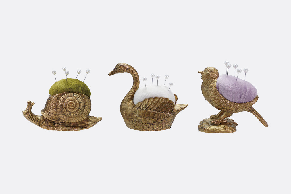 Set of three pin cushions, gold gilded animal shaped pin cushions, snail, swan