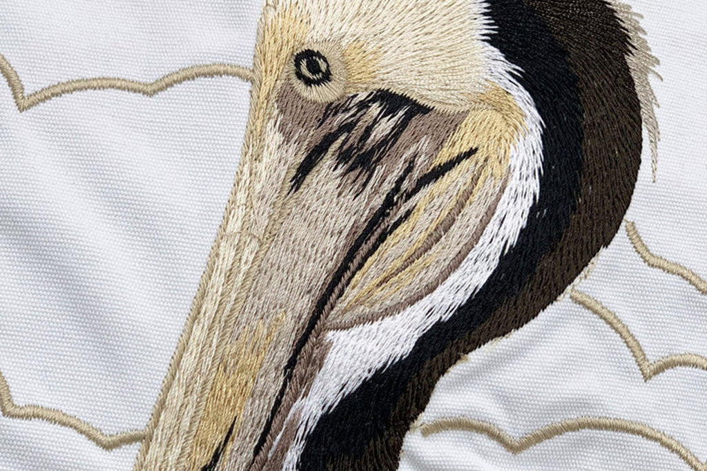 closeup detail view of embroidered pelican