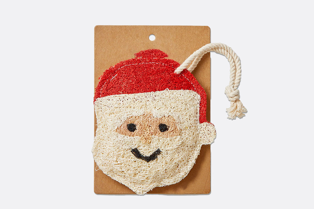 Santa Claus face dish loofah on a brown card with a white background