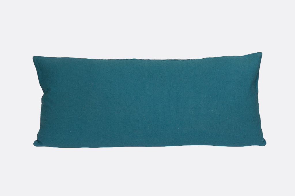 Teal rectangular pillow on a white background