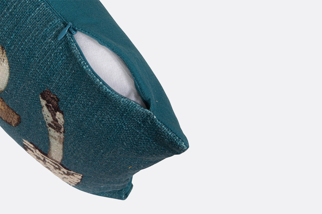 Teal fabric with a textured surface on a white background