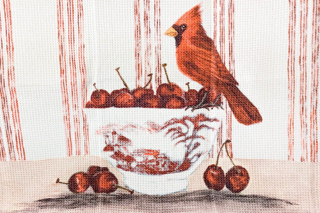 A set of four tea towels with red blue, yellow, and brown stripes. Each Towel features a bird stood upon a pile of assorted fruits.
