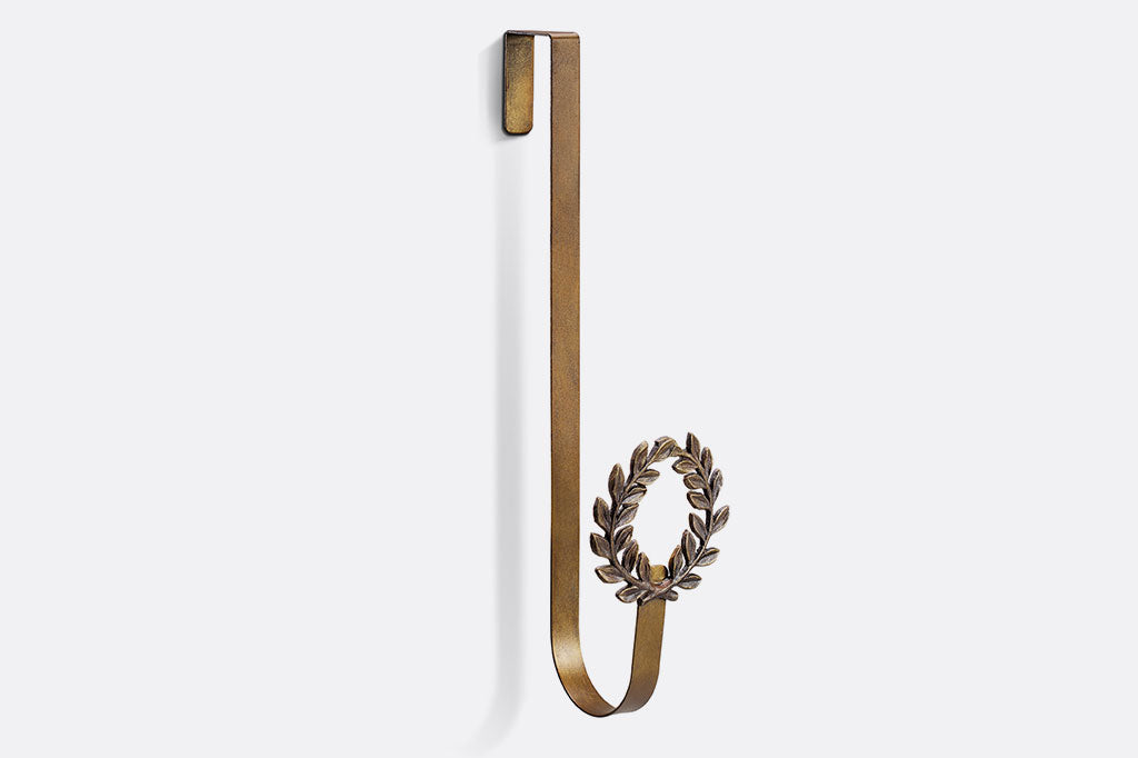 Bronze finish wreath hanger that features laurel wreath traditional motif 