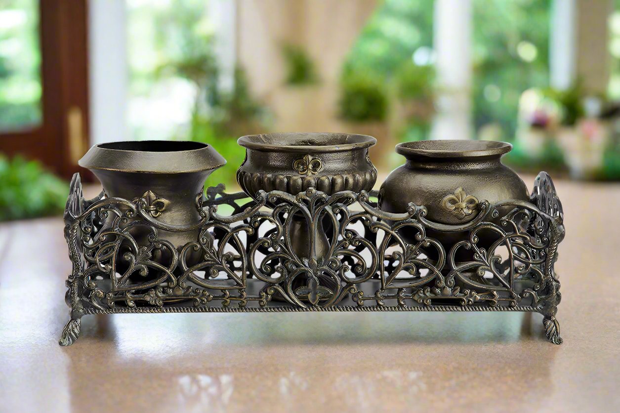 Fleur de Lys Herb Pots with Base, shown on marble floor in garden conservatory