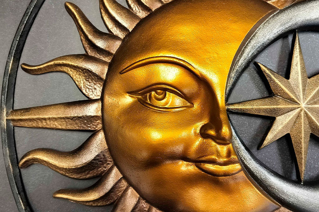 Close up view of the sun and star relief sculpting on Stellar Skies Wall art