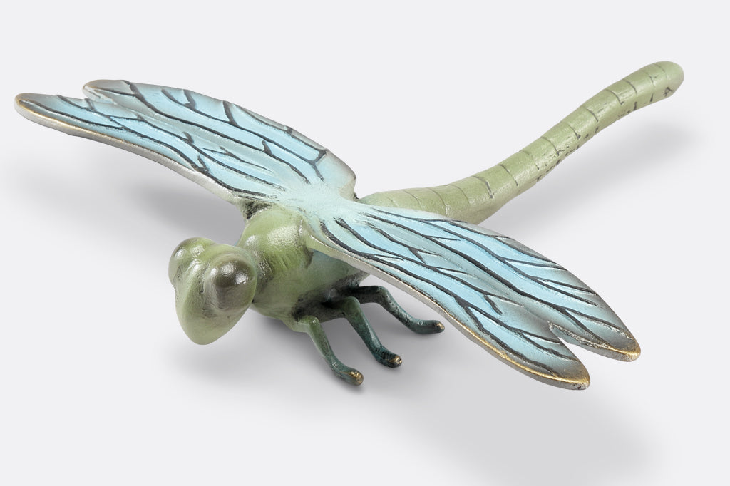 top view of the blue and green finish on a cast metal dragonfly garden sculpture