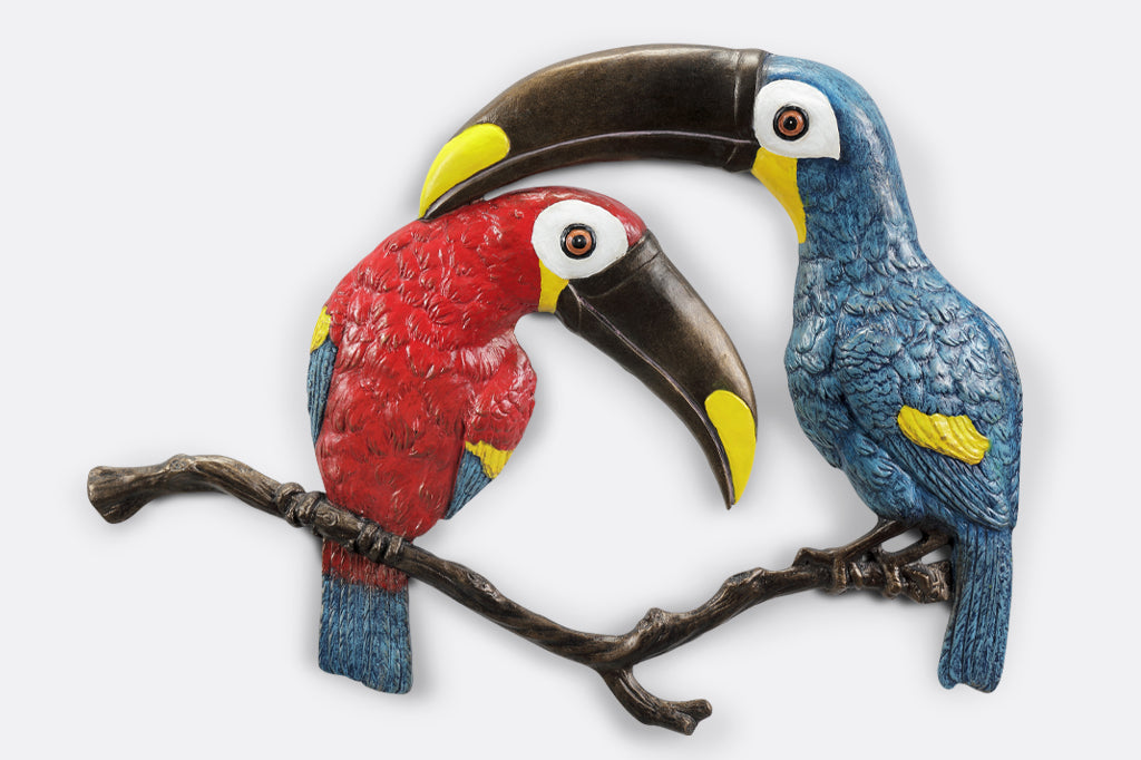 Metal Toucan pair one red and one blue wall plaque 