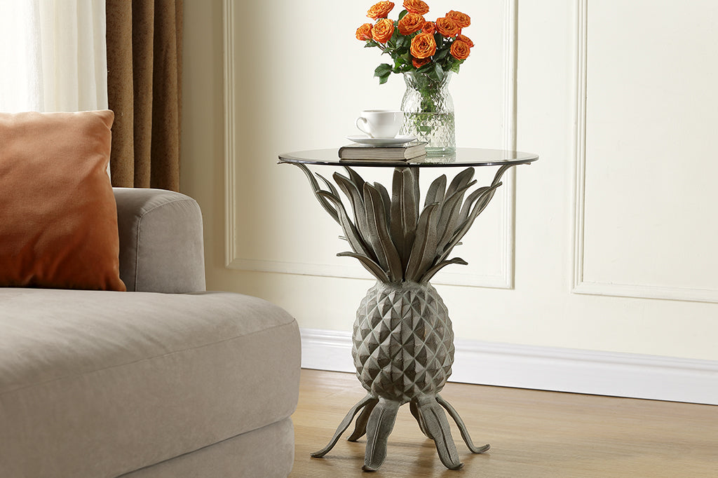 Metal pineapple accent table with gray smoked glass  
