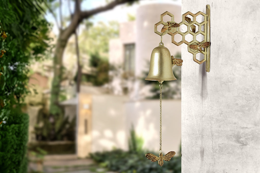 Metal honeycomb and bee, mounted garden bell