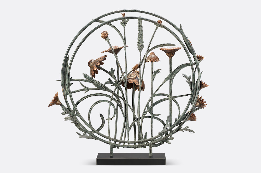 back of floral cast metal sculpture