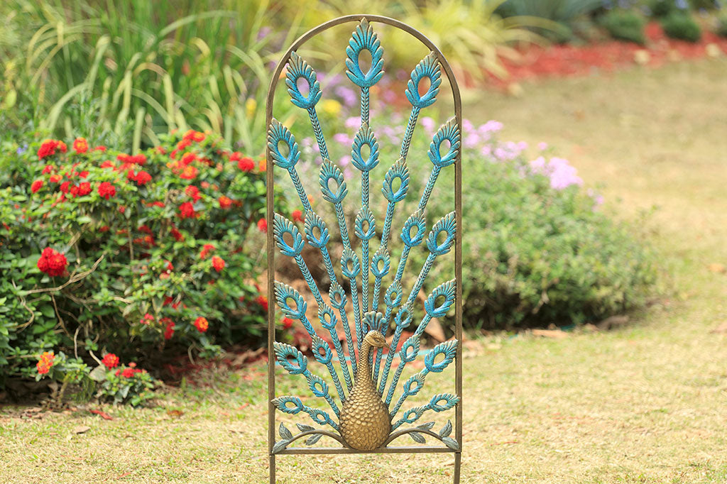 Peacock themed trellis with feathers providing radiating support. Finished in blues and golds.