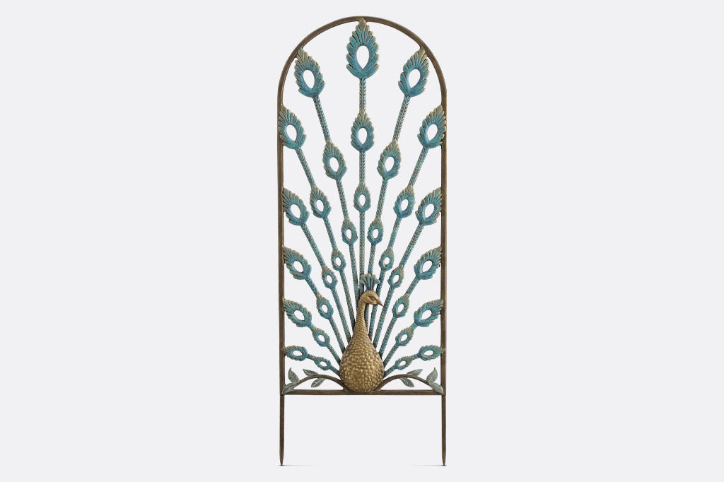 Peacock themed trellis with feathers providing radiating supports n blues and golds.