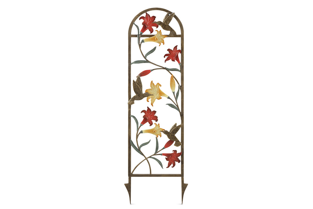 back side view of trellis with coral and yellow lilies and a hummingbird motif