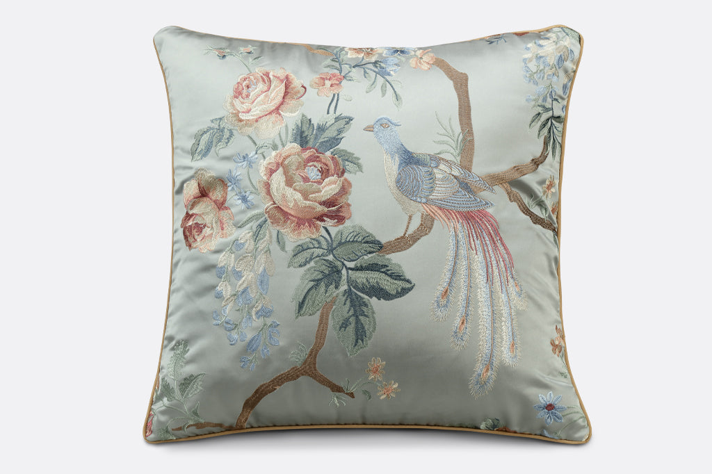 soft blue satin pillow, embroidered with peonies, branches and a peacock 
