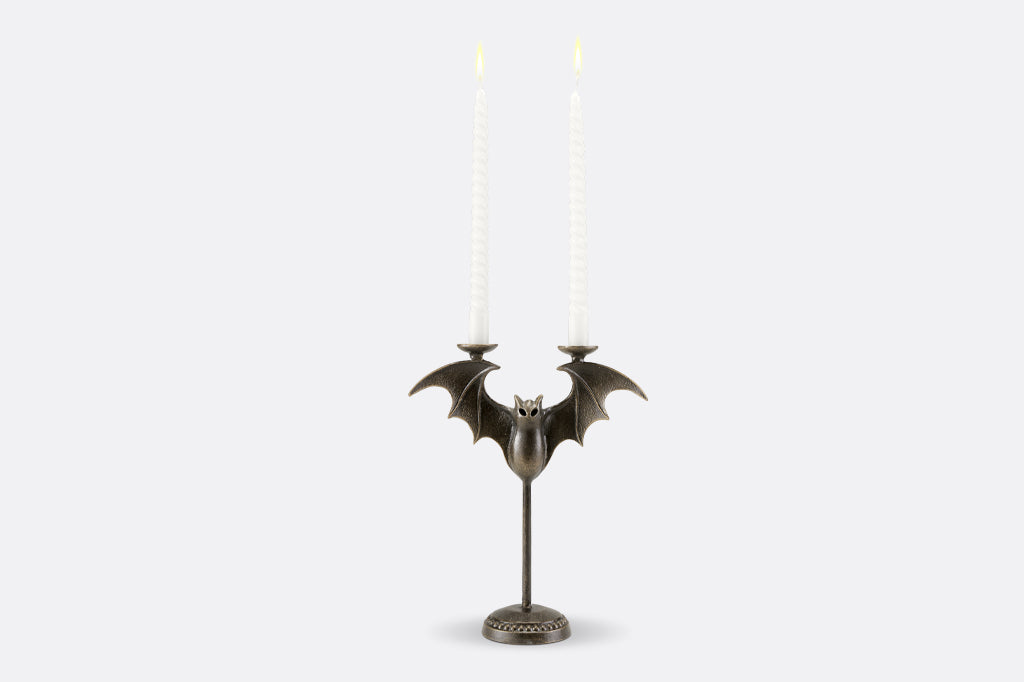 Cast metal bat tapper candle holder, face front