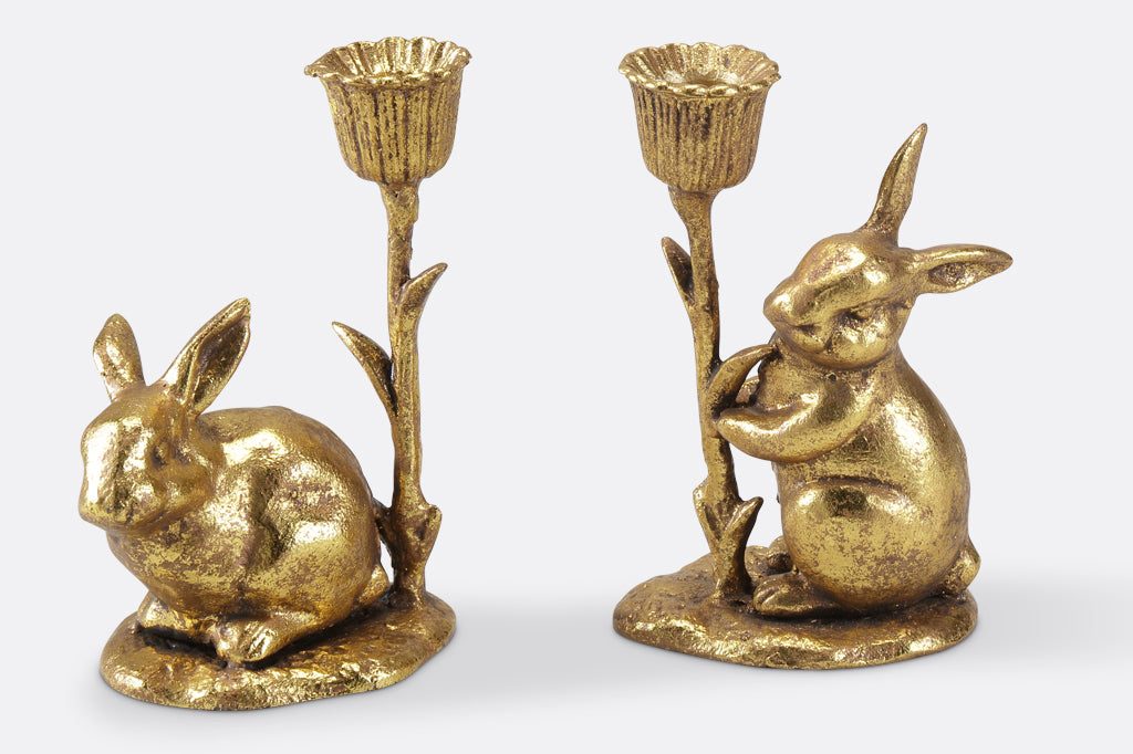 close up of cast metal bunny candleholder with flowers