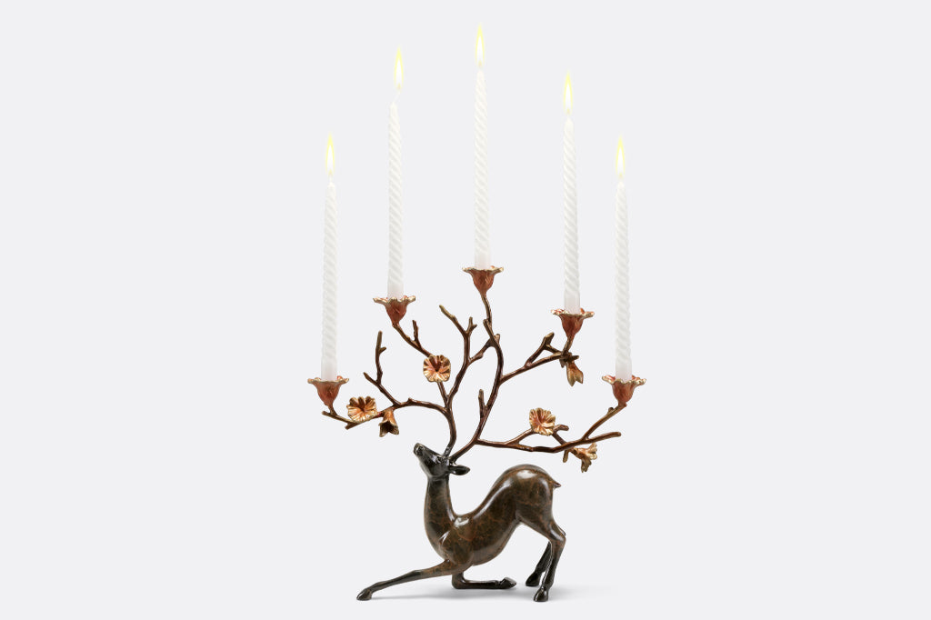 Cast Metal whimsical deer and flora candleholder, with white twisted taper candles 