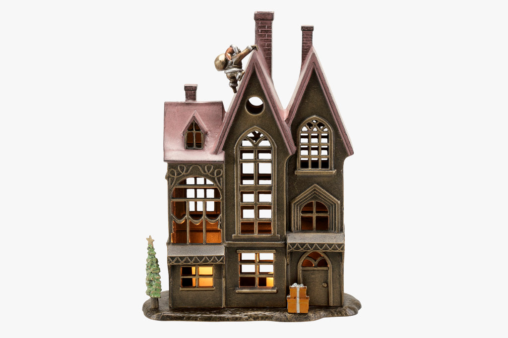 Up on the Rooftop Candle House candleholder with removeable santa, tree, and present accessories