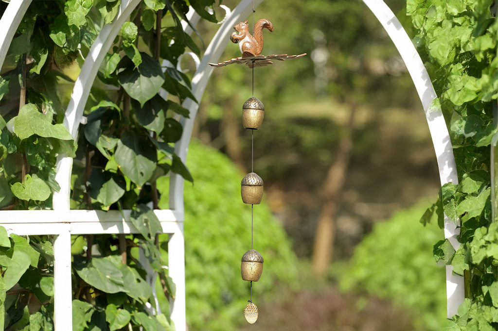 Decorative wind art with a squirrel and acorn design