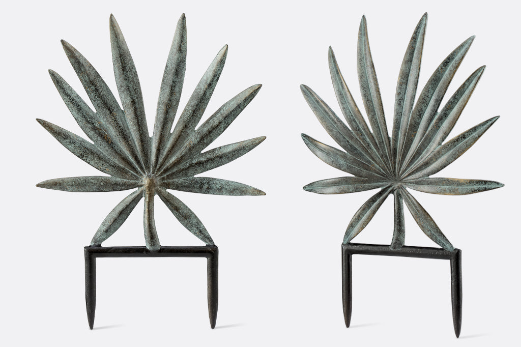 cast metal spiky palm leaf planter trellis