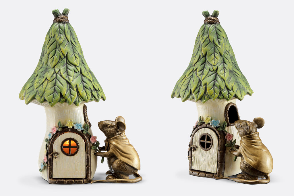 Garden candle lantern shaped like mouse and cottage - showing two views around the house; candlelight glows within