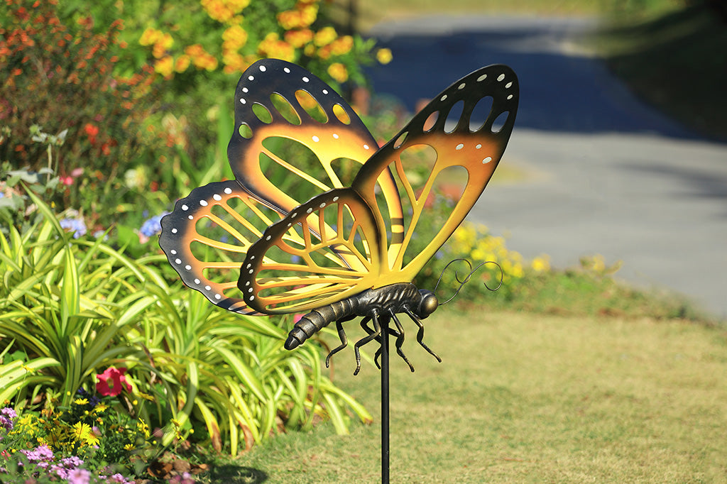 A garden stake of a monarch butterfly.
