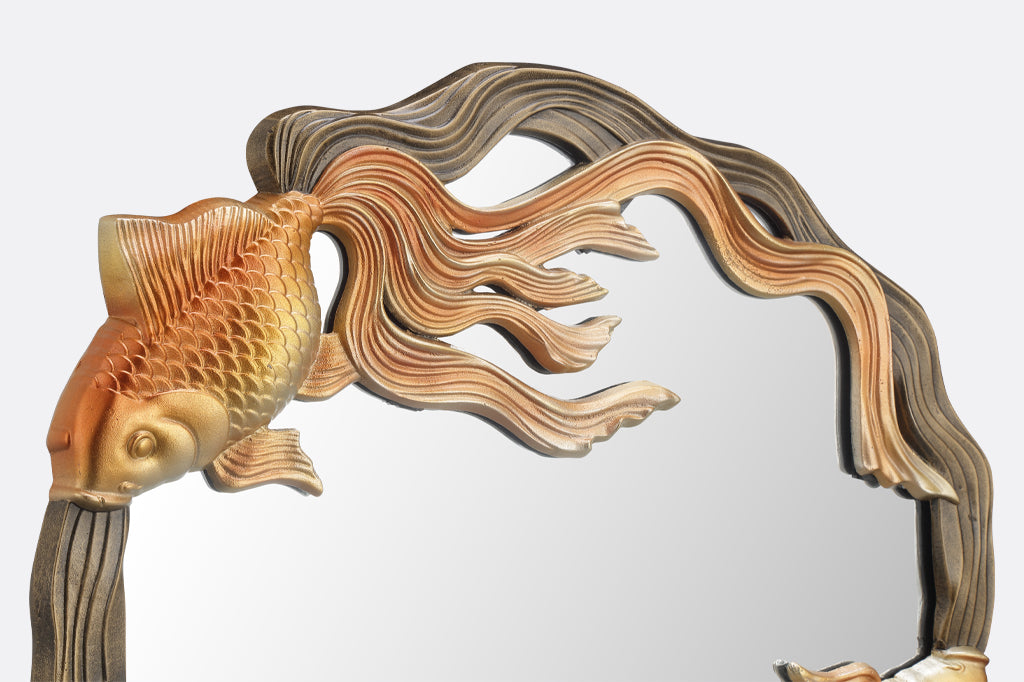 detailed view of golden koi fish with shimmering orange and yellow highlights 