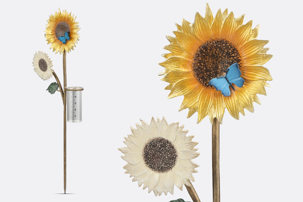 double sunflower cast metal rain catcher with one yellow sunflower with blue butterfly in center and one white sunflower 