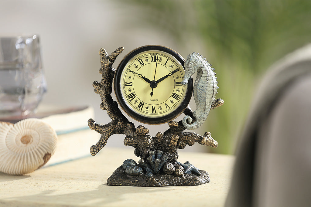 Clock with organic ocean like inspired design and a seahorse attached