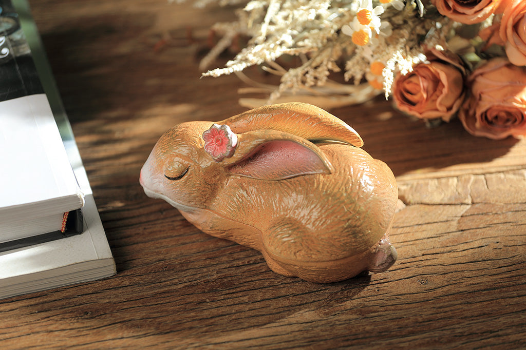 A sleeping bunny shaped keepsake box
