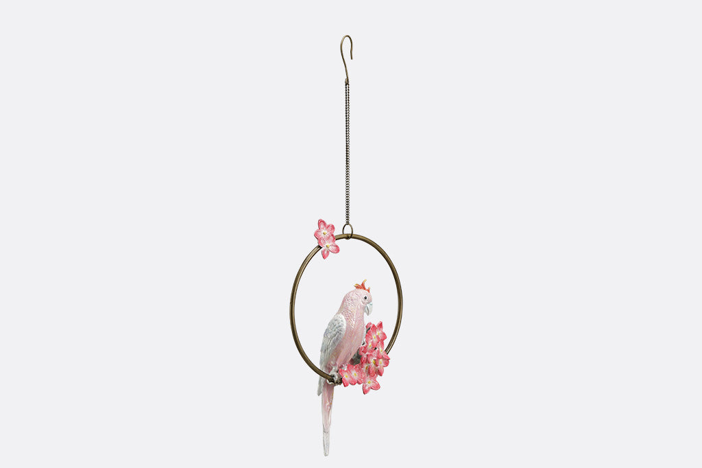 Decorative hanging sculpture with a bird and flowers