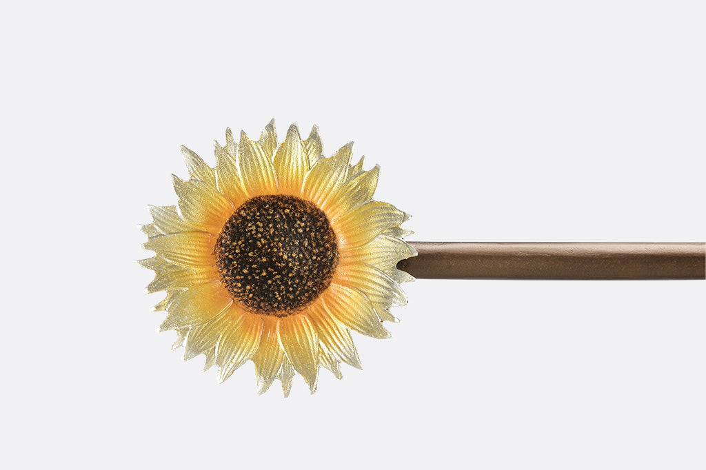 A flag stand of two sunflowers