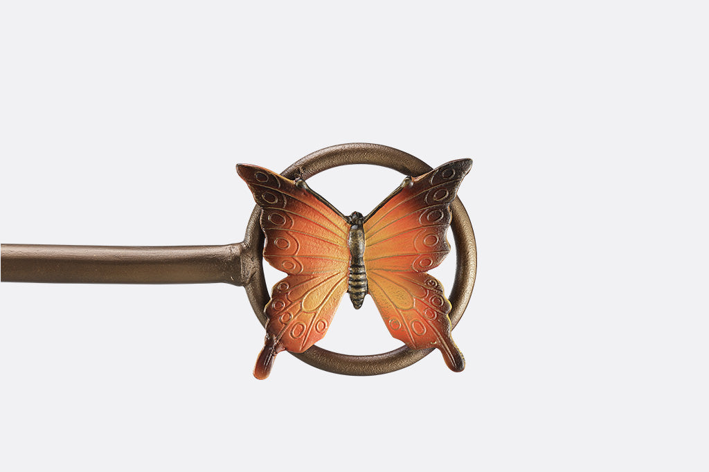 A flag stand with two butterflies