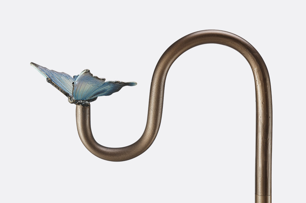 A flag stand with two butterflies