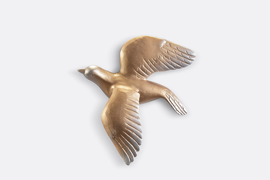 A set of 5 gold birds posed in flight.