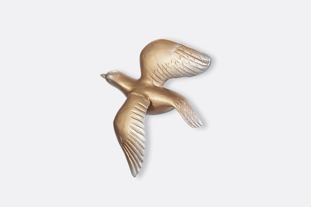 A set of 5 gold birds posed in flight.