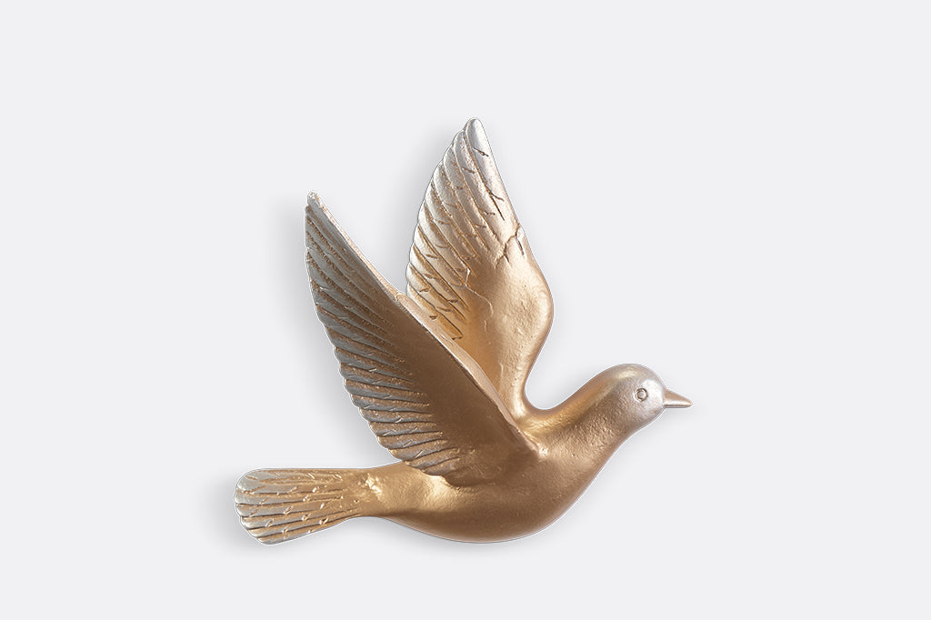 A set of 5 gold birds posed in flight.