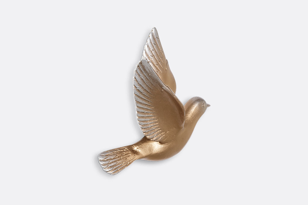 A set of 5 gold birds posed in flight.
