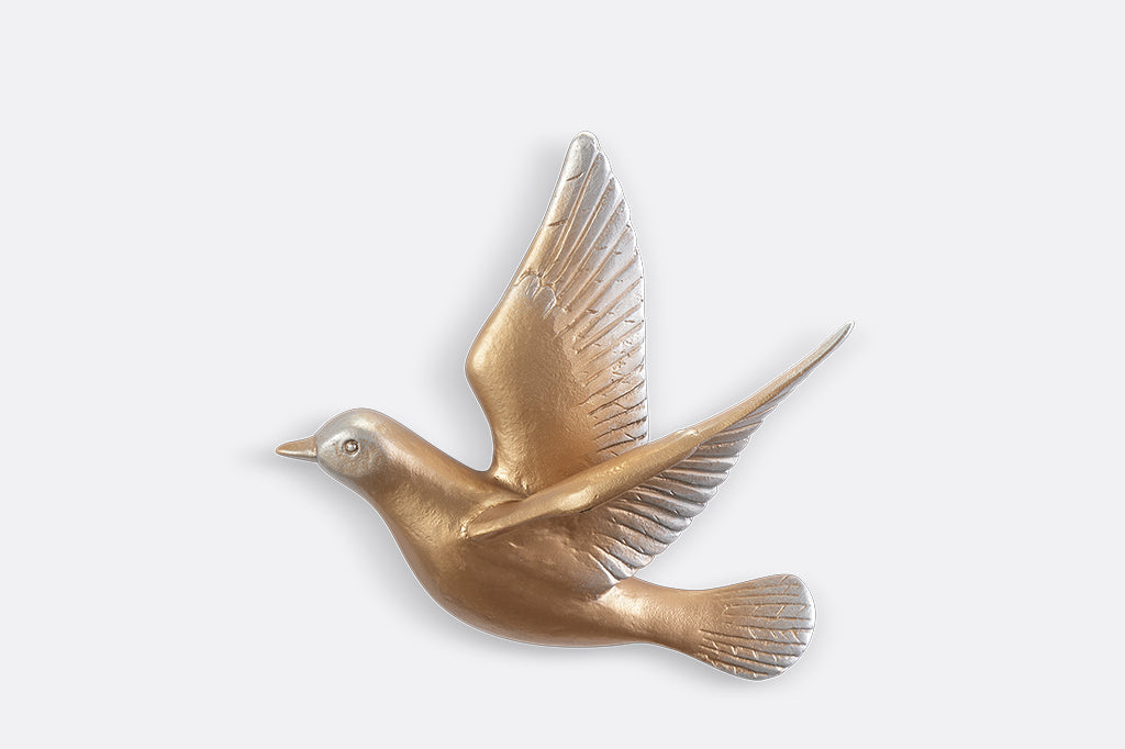 A set of 5 gold birds posed in flight.