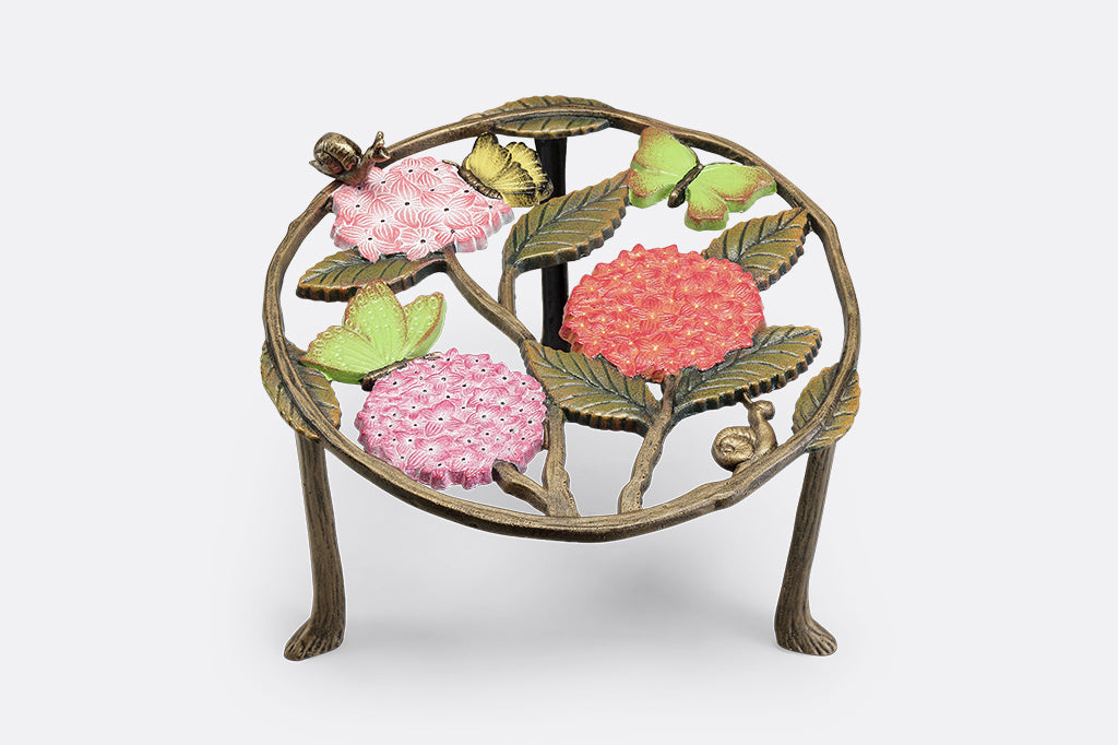 A set of 2 plant stands featuring details of pink hydrangeas, leaves, snails, and butterflies.