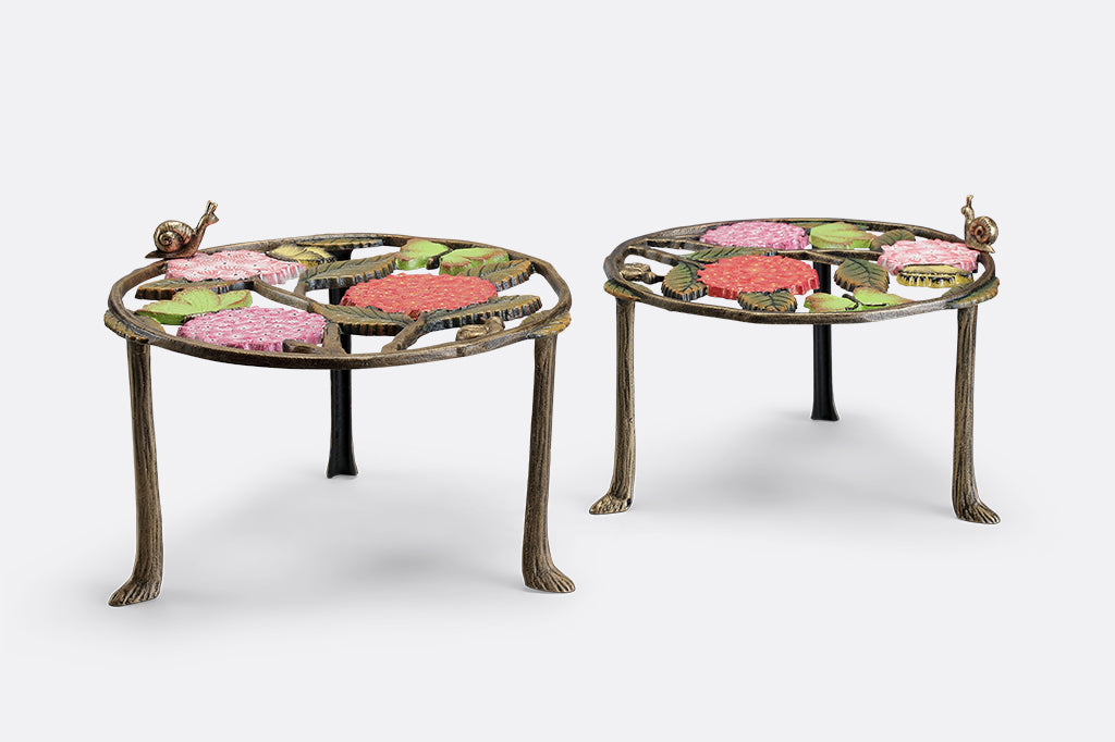 A set of 2 plant stands featuring details of pink hydrangeas, leaves, snails, and butterflies.