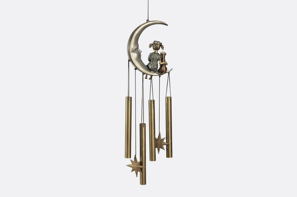 windchime garden decor with girl and pet dog sitting on a crescent moon. bronze tube chimes and star pendants
