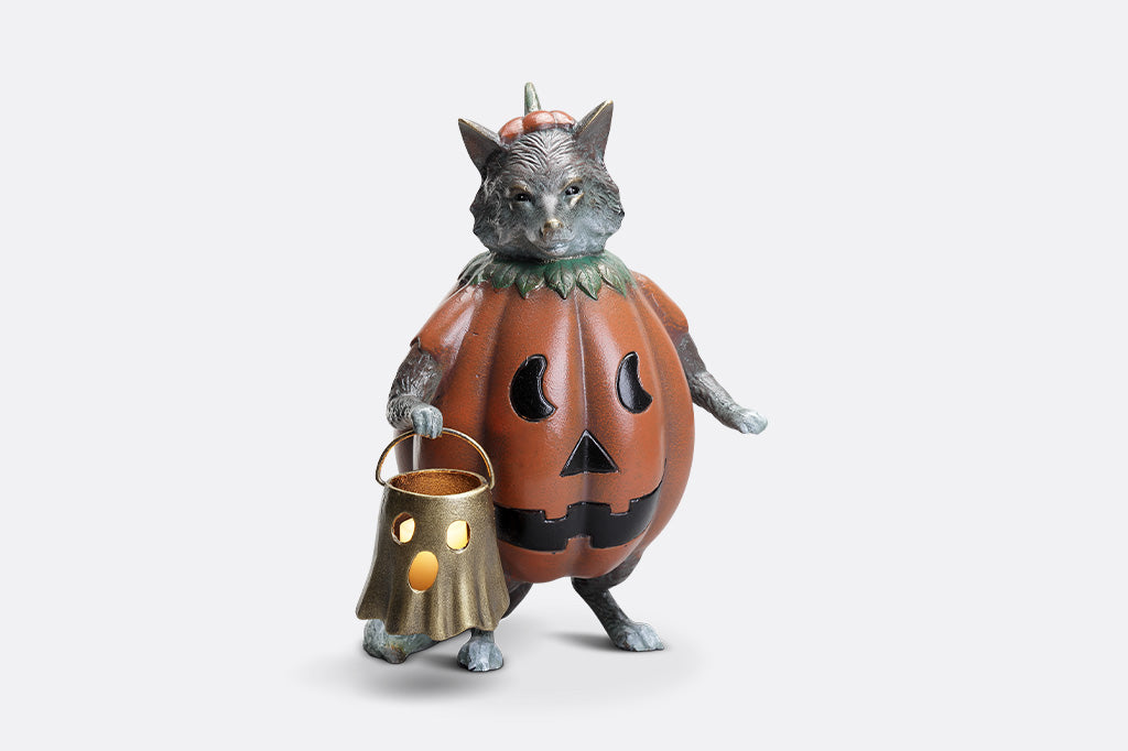 Animated character of a wolf in a pumpkin costume holding a lantern on a white background