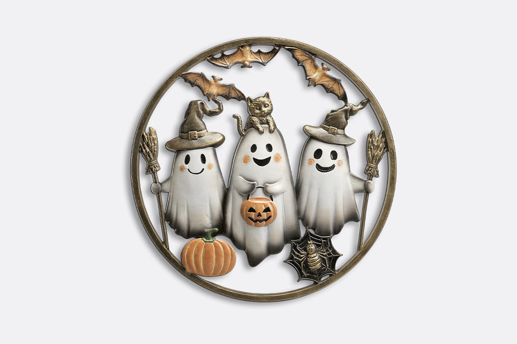 Decorative wall art with cartoon ghosts, a pumpkin, and bats on a white background