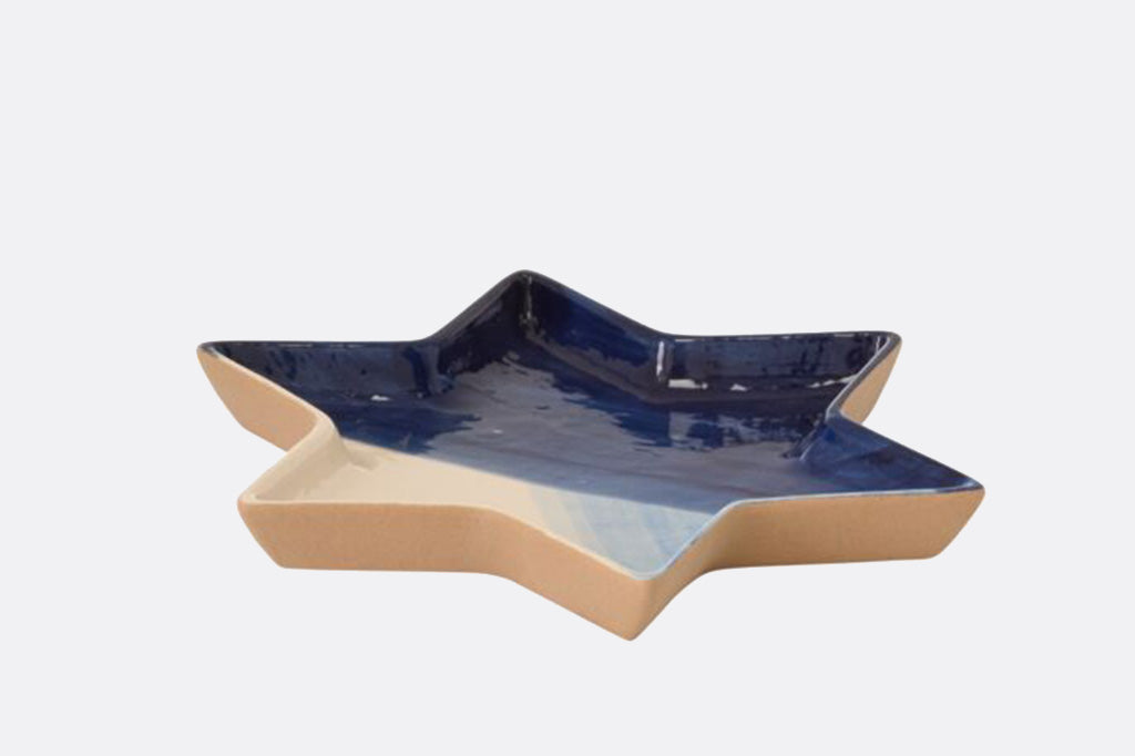 Star of David-shaped ceramic dish with a blue and beige gradient on a white background