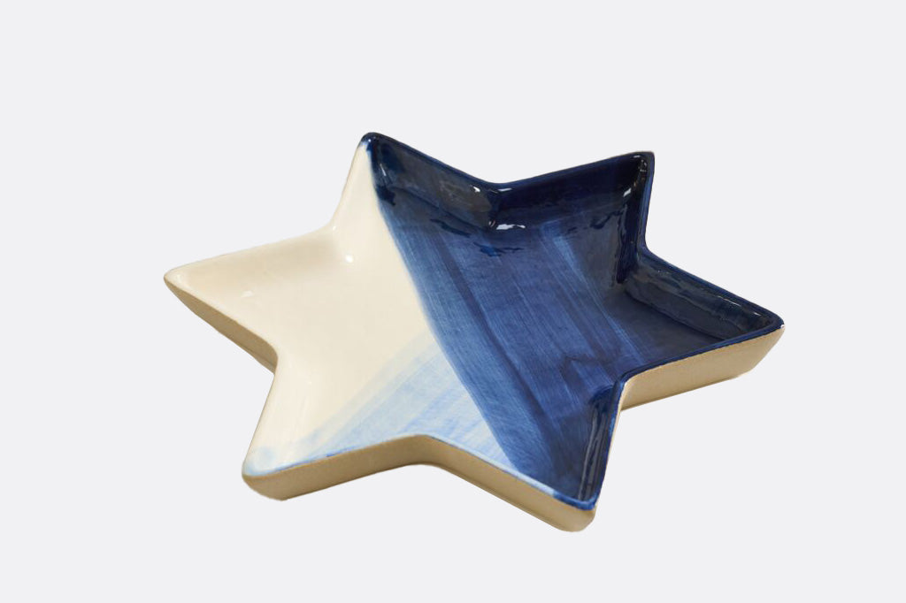 Star of David-shaped ceramic dish with a blue and beige gradient on a white background