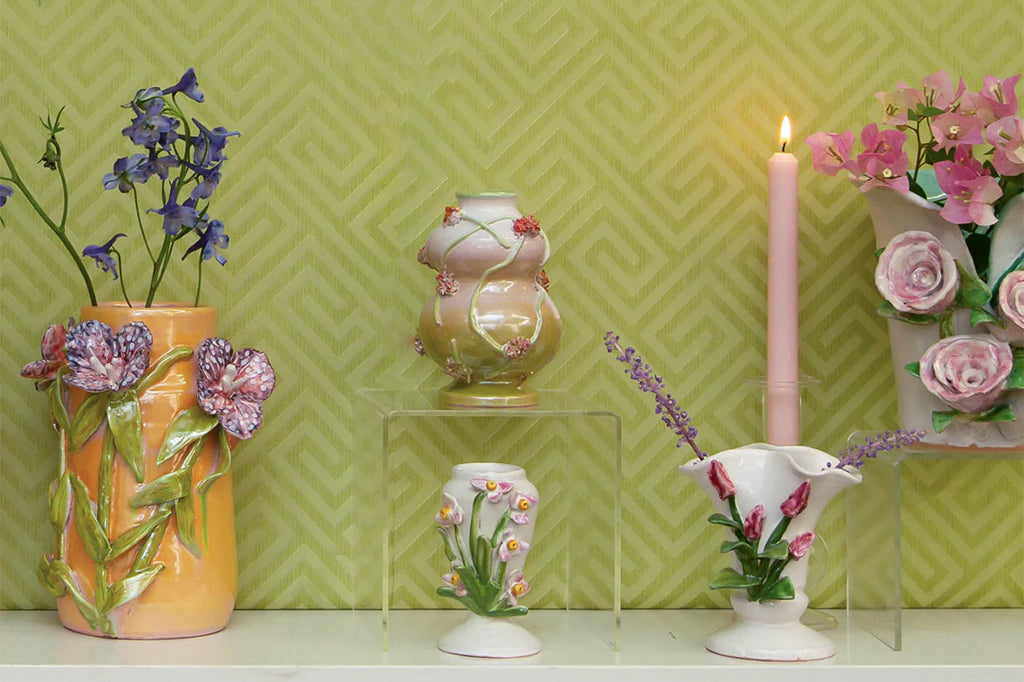irregular shaped vase with 3-d sculpted floral design 
